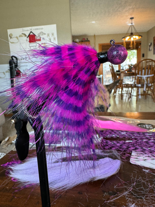 Purple and pink marabou feather jig with custom paint with gamakatsu hook and UV sealed head paint lead free