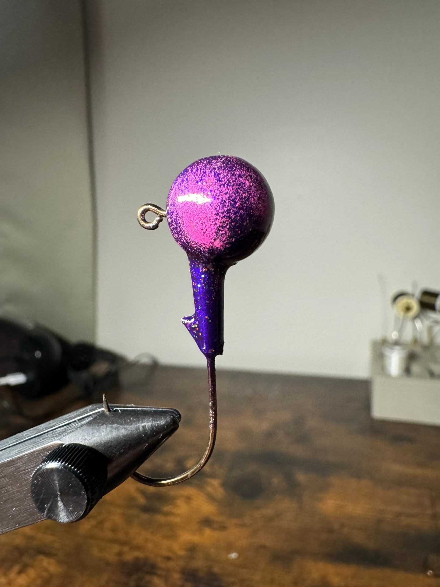 Pink and purple lead free jig for bass and walleye with bait keeper and clean hook eye