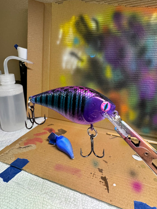 2.85” Shallow Diver Square Bill Hand Painted - Grunters Outdoors cotton candy colored lure pink purple blue purple and violet with heavy duty coating