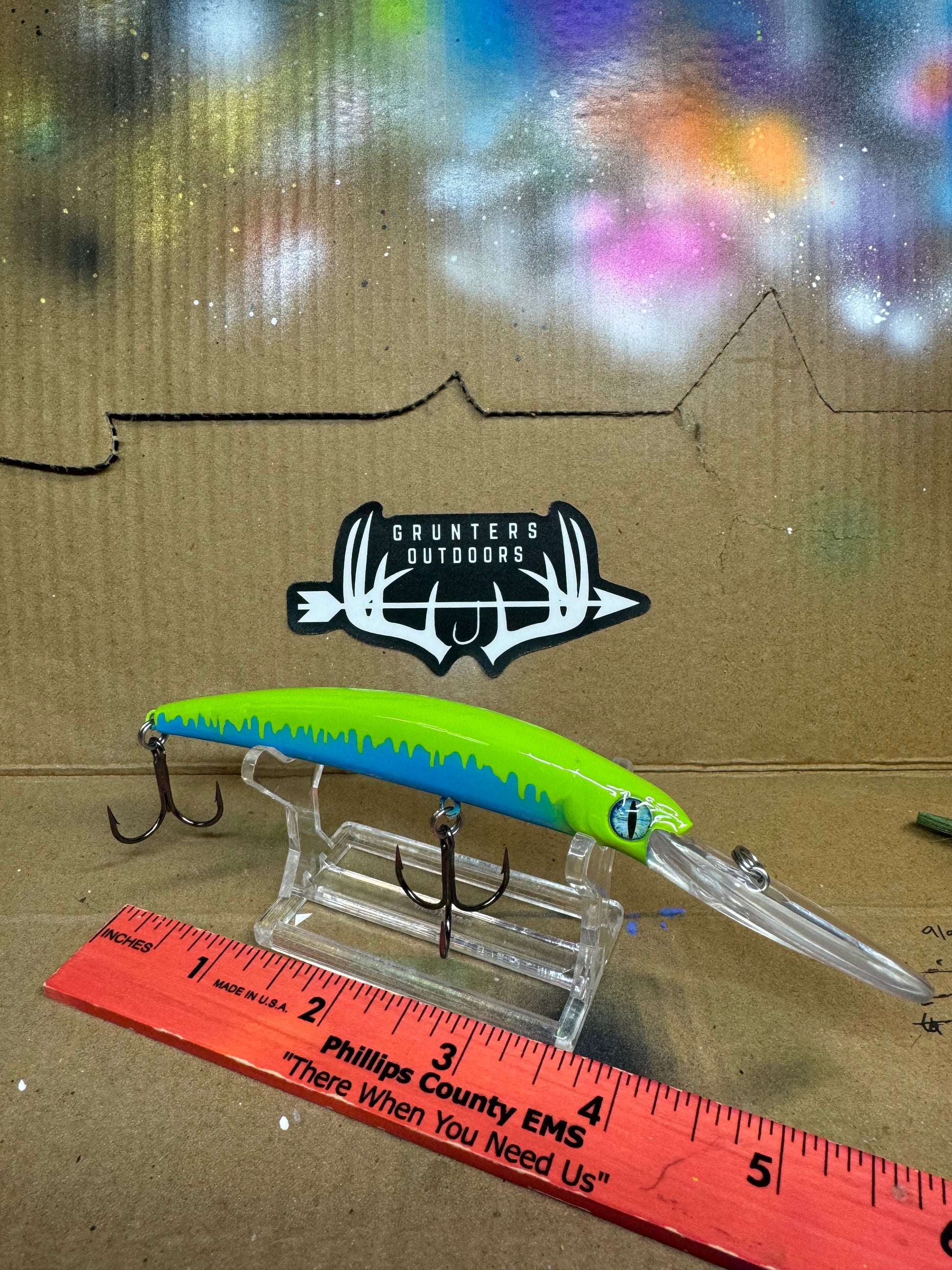 Walleye deep diver lure with sky blue and line green colors with lime green dripping down and blue eyes